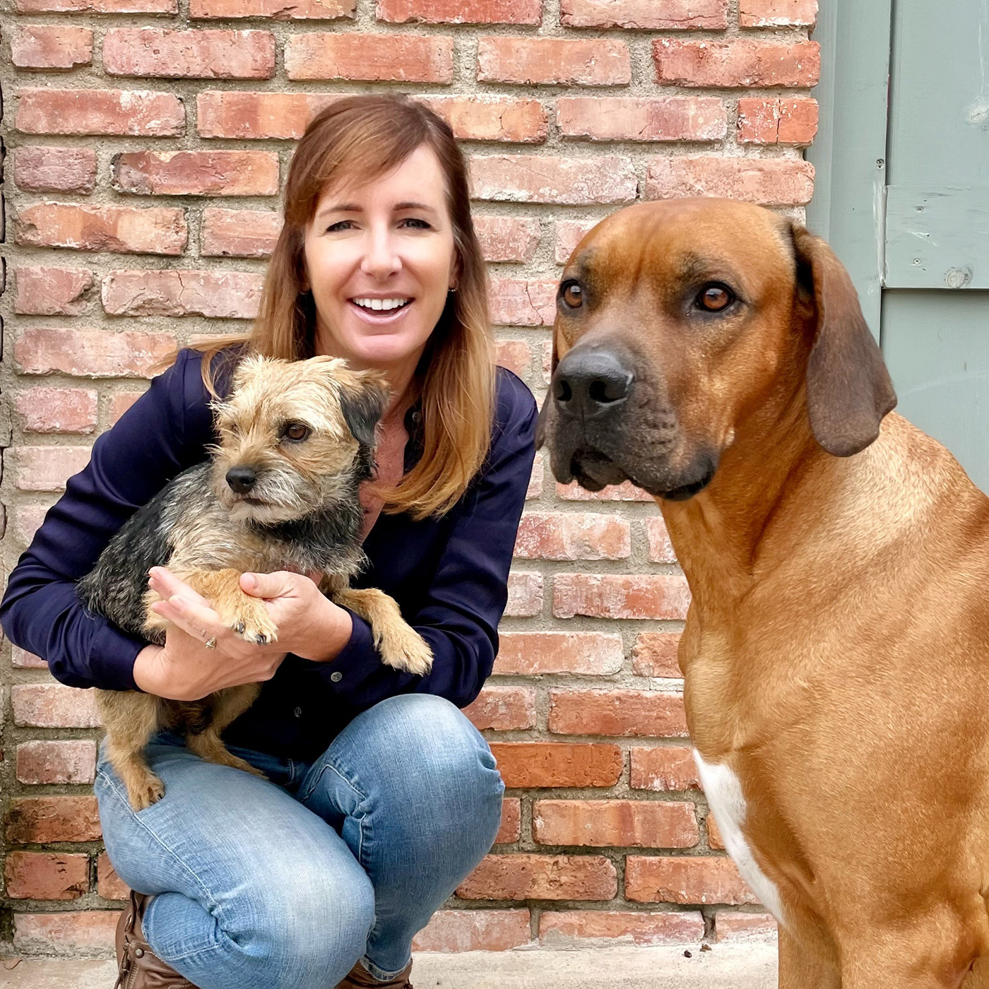 Lucy Postins of The Honest Kitchen and her dogs