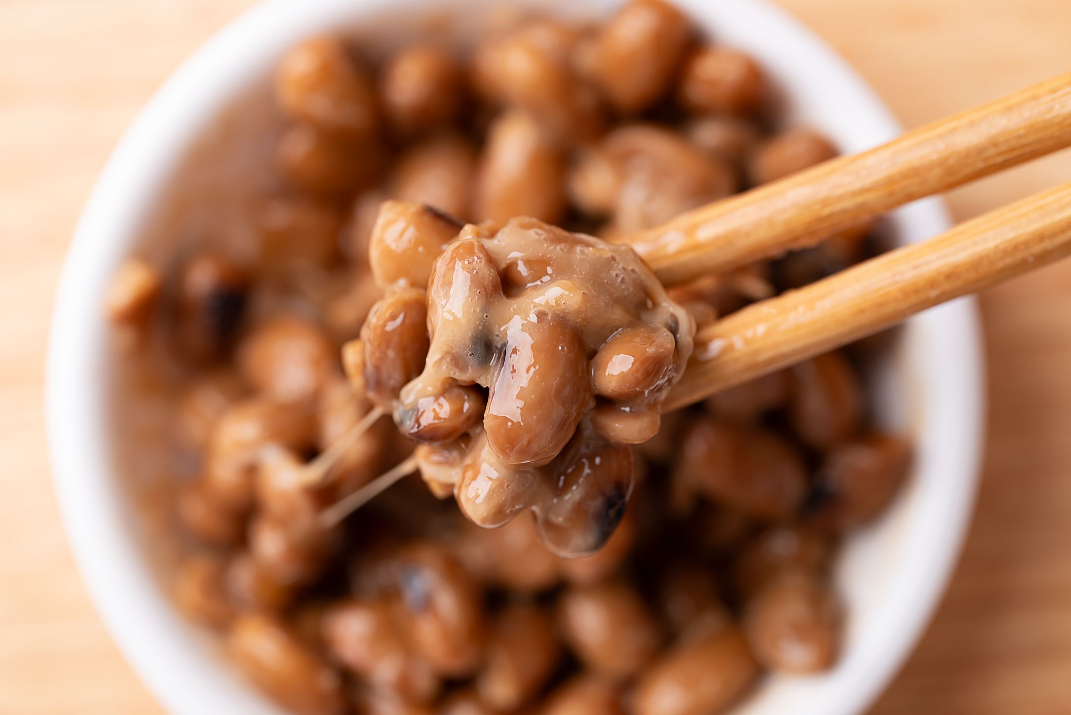 Natto in a bowl with chopsticks