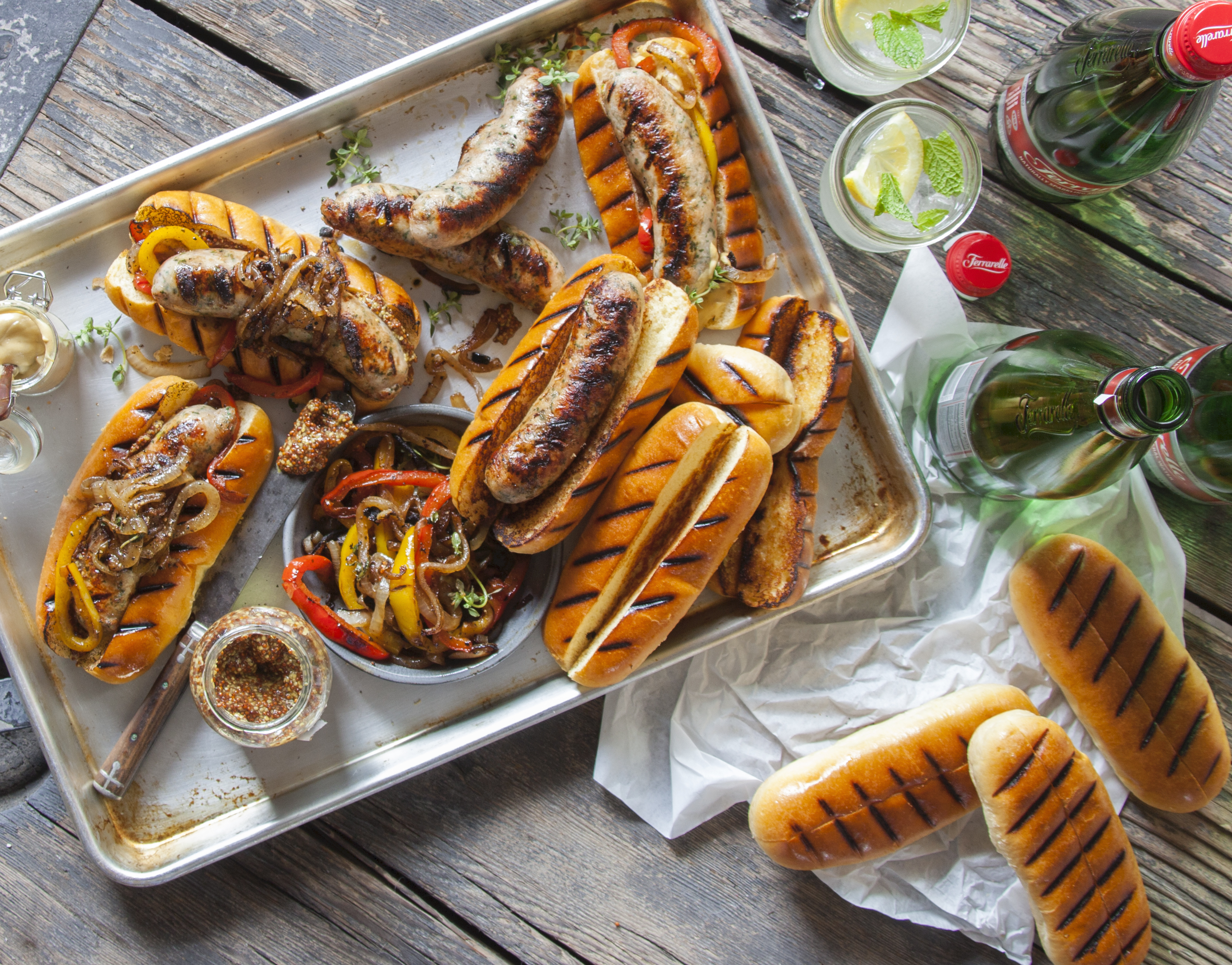 sausages and buns on a table