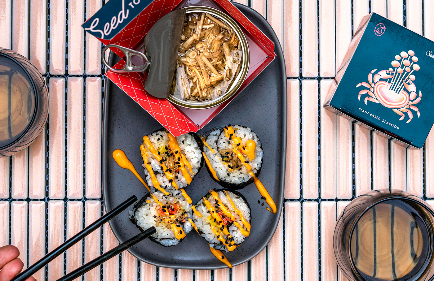 tinned fish by seed served on sushi platter