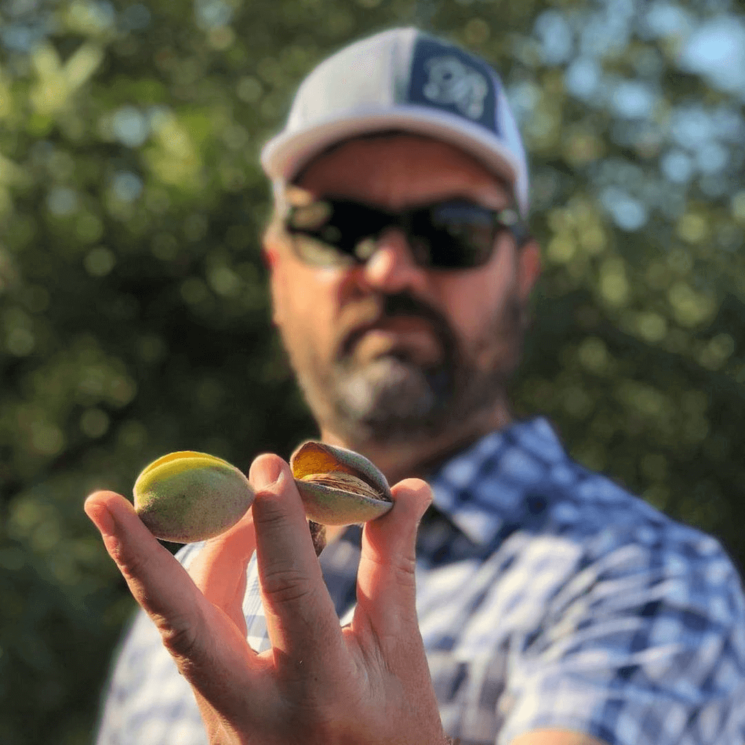 Matt Billings holding almonds